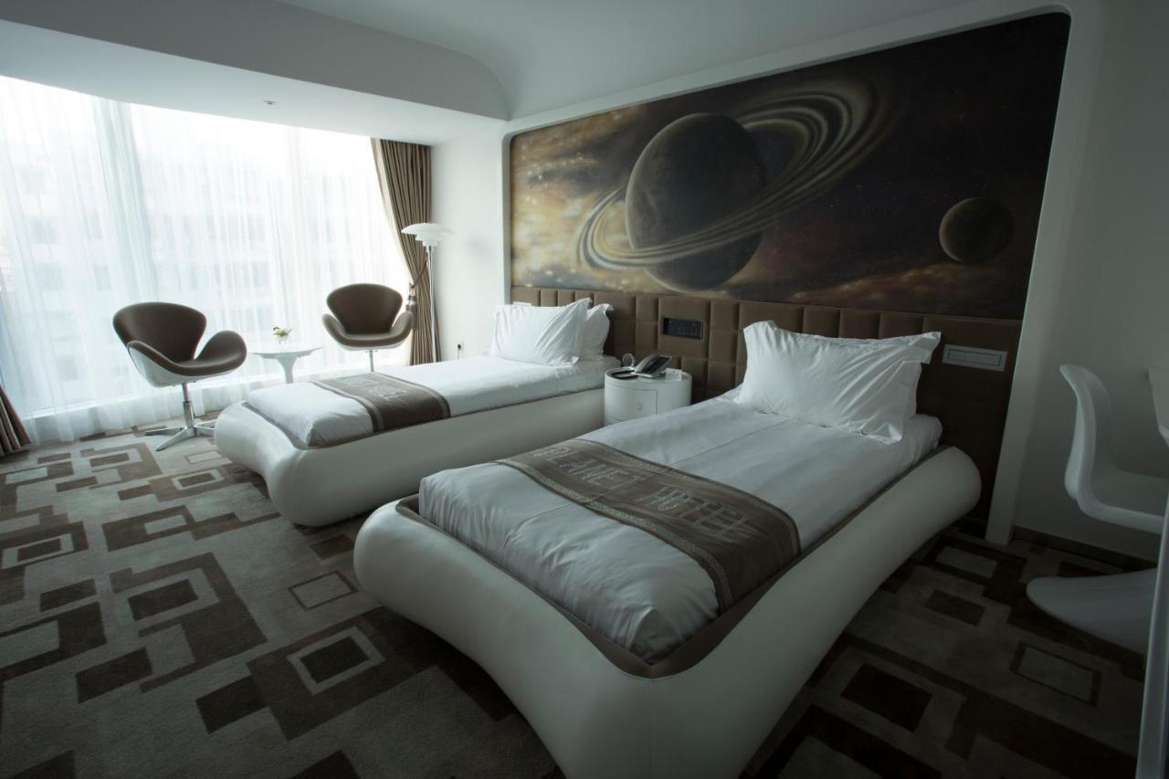 Guangzhou Planet Hotel Room photo